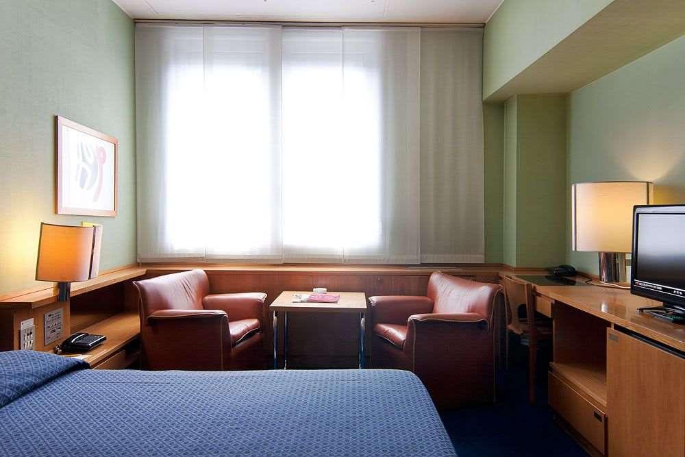 Hotel Galileo Milão Quarto foto